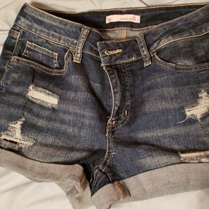 Distressed low rise denim shorts